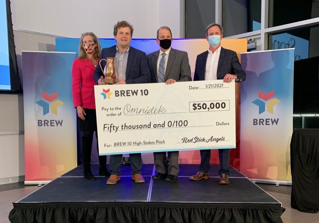Omnidek CEO Chris Jordan accepts $50,000 High Stakes Pitch investment prize (2021).